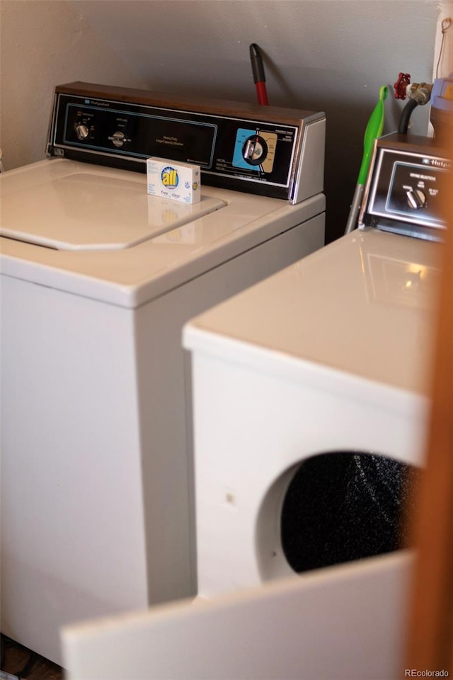 laundry area with washing machine and dryer