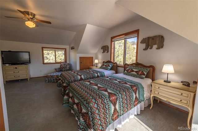 bedroom featuring lofted ceiling, ceiling fan, and carpet flooring