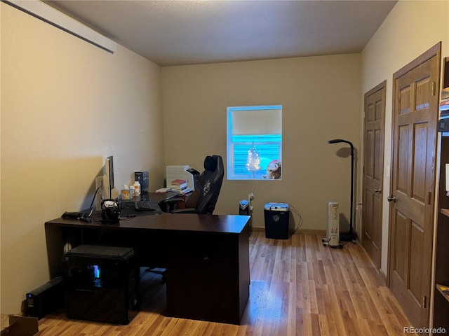 office featuring light hardwood / wood-style flooring