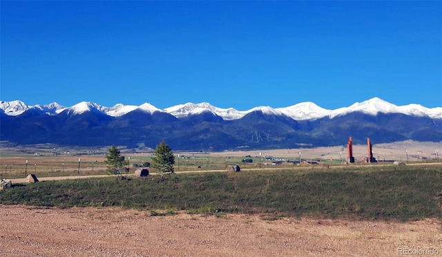 mountain view featuring a rural view