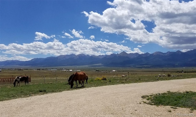 mountain view featuring a rural view