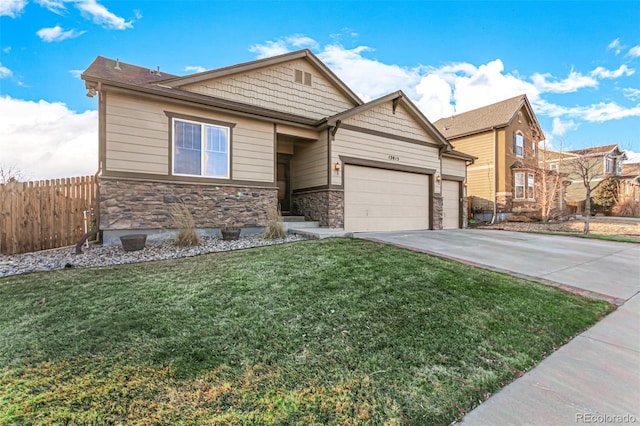 view of front facade featuring concrete driveway, an attached garage, fence, stone siding, and a front lawn