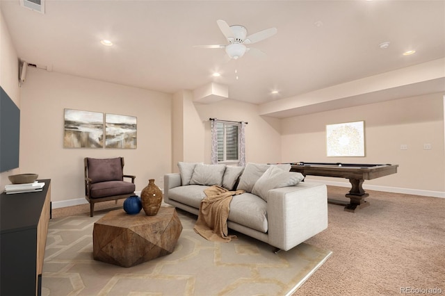 living area with baseboards, recessed lighting, visible vents, and light colored carpet