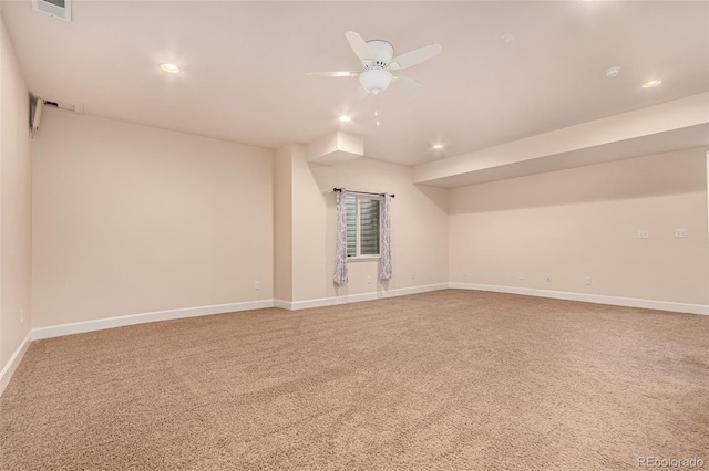 bonus room featuring recessed lighting, baseboards, and light colored carpet