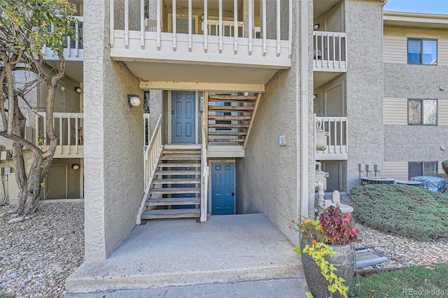 doorway to property featuring a balcony