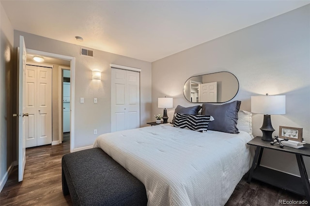 bedroom with a closet and dark hardwood / wood-style flooring