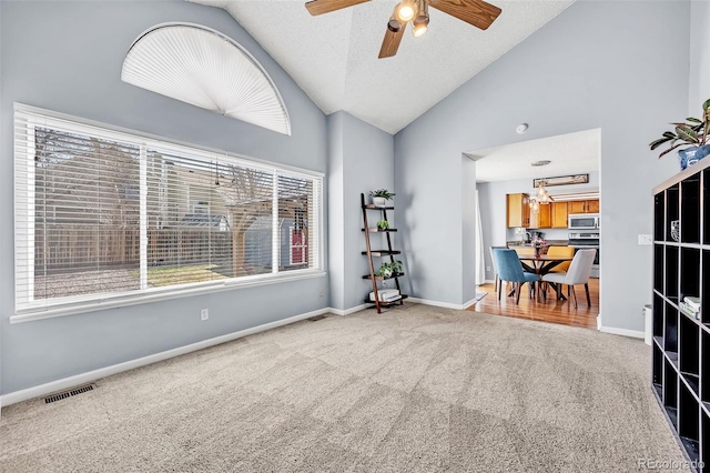 unfurnished room with visible vents, baseboards, a ceiling fan, and carpet flooring