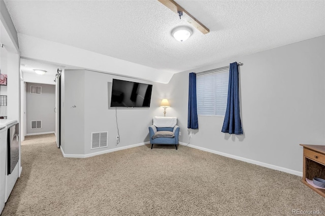 living area with visible vents, carpet floors, and baseboards