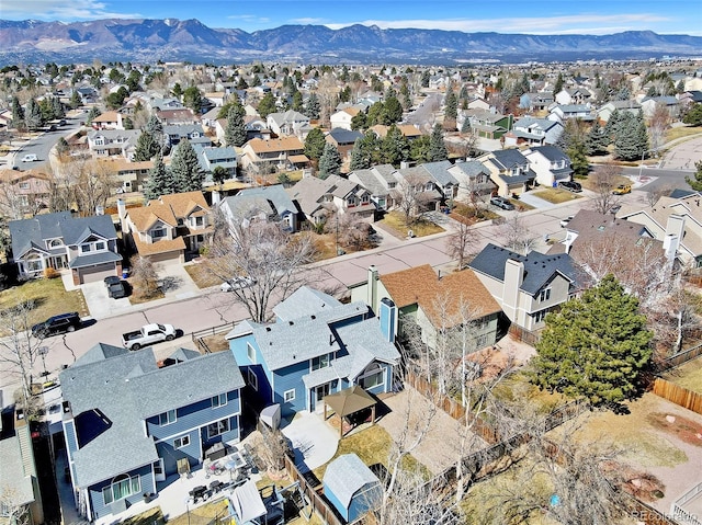 drone / aerial view with a mountain view and a residential view