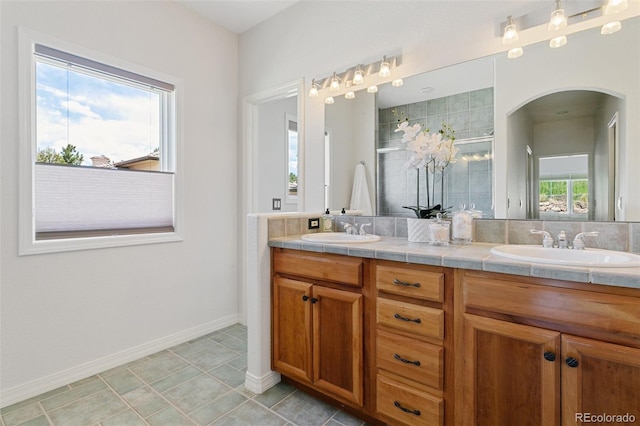 2467 Spanish Oak Ter, Colorado Springs, CO 80920 - full bath with double vanity and a shower stall