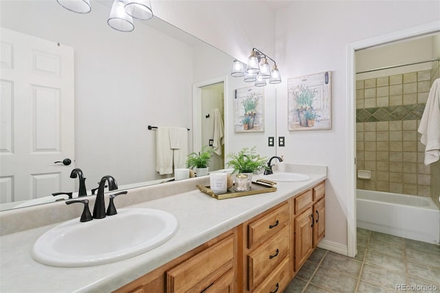 2467 Spanish Oak Ter, Colorado Springs, CO 80920 - bathroom featuring double vanity, tile patterned flooring, and shower / bath combination