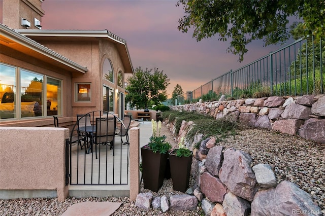 2467 Spanish Oak Ter, Colorado Springs, CO 80920 - view of patio featuring outdoor dining area