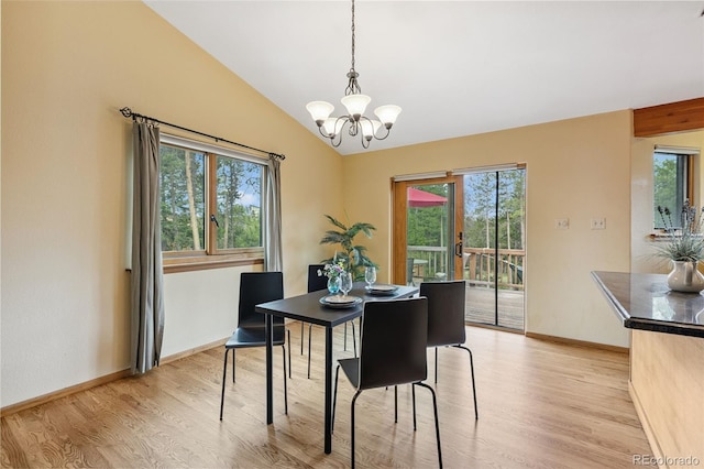 10668 Crystal Way, Morrison, CO 80465 - dining room with light wood-type flooring, plenty of natural light, a chandelier, and lofted ceiling