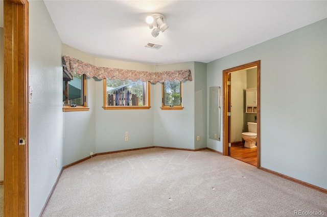10668 Crystal Way, Morrison, CO 80465 - unfurnished bedroom featuring carpet flooring and ensuite bathroom