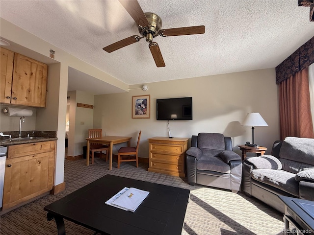 6 Emmons Rd Unit 379/381, Mount Crested Butte, CO 81225 - living area featuring ceiling fan, dark carpet, and a textured ceiling