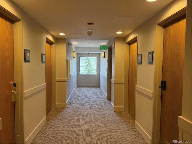 6 Emmons Rd Unit 379/381, Mount Crested Butte, CO 81225 - corridor with carpet flooring, a decorative wall, and recessed lighting