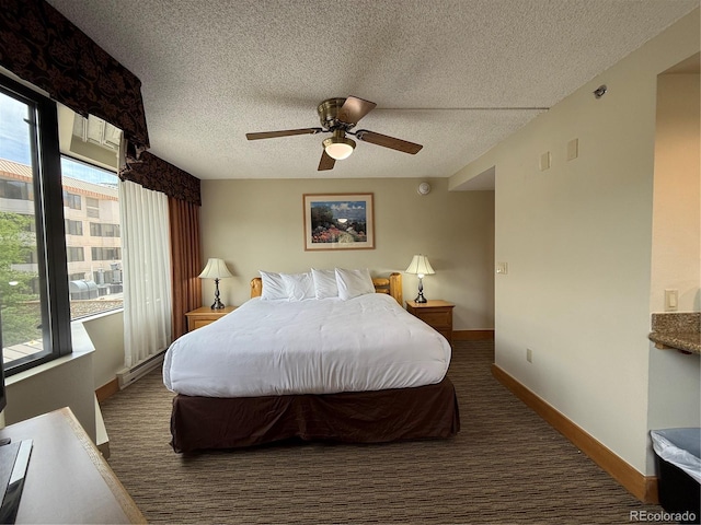 6 Emmons Rd Unit 379/381, Mount Crested Butte, CO 81225 - carpeted bedroom featuring a textured ceiling and ceiling fan