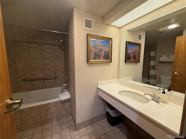 6 Emmons Rd Unit 379/381, Mount Crested Butte, CO 81225 - bathroom featuring tiled shower / bath combo, vanity, and tile patterned flooring