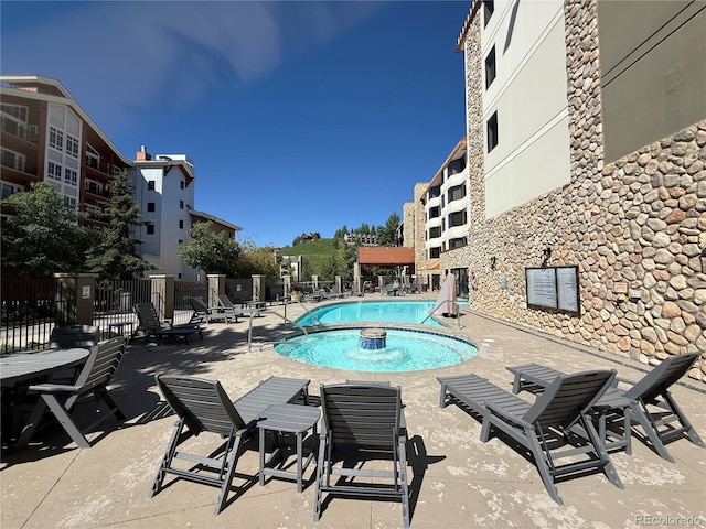 6 Emmons Rd Unit 379/381, Mount Crested Butte, CO 81225 - community pool featuring a patio area