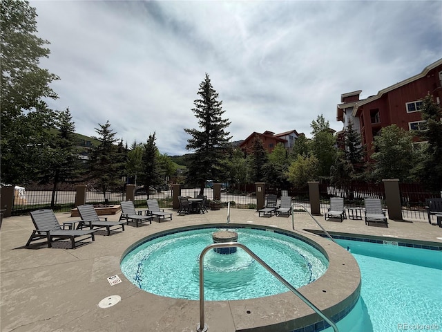 6 Emmons Rd Unit 379/381, Mount Crested Butte, CO 81225 - community pool featuring a patio
