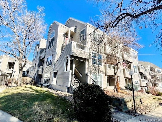 view of building exterior with a residential view