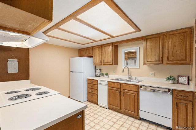 3103 Broadmoor Valley Rd Unit B, Colorado Springs, CO 80906 - kitchen featuring light countertops, range hood, a sink, and white appliances