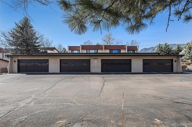 3103 Broadmoor Valley Rd Unit B, Colorado Springs, CO 80906 - garage with a mountain view