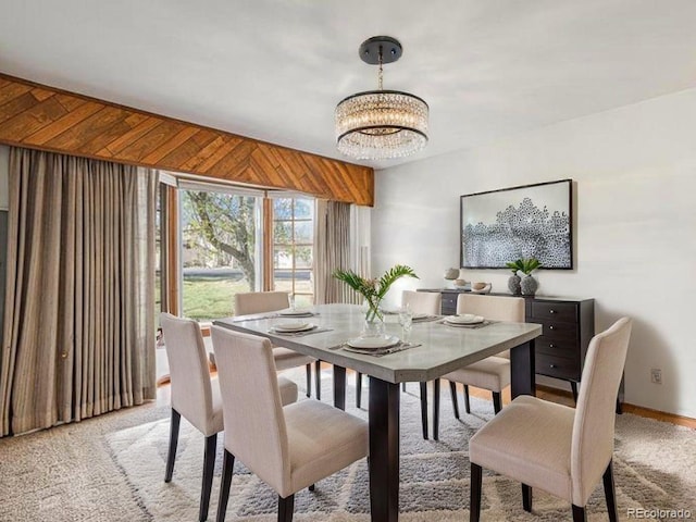 3103 Broadmoor Valley Rd Unit B, Colorado Springs, CO 80906 - dining space with a notable chandelier and baseboards