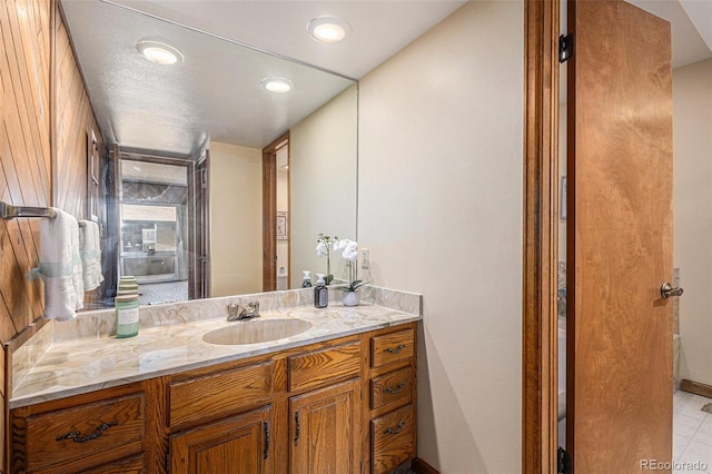 3103 Broadmoor Valley Rd Unit B, Colorado Springs, CO 80906 - bathroom featuring vanity and recessed lighting