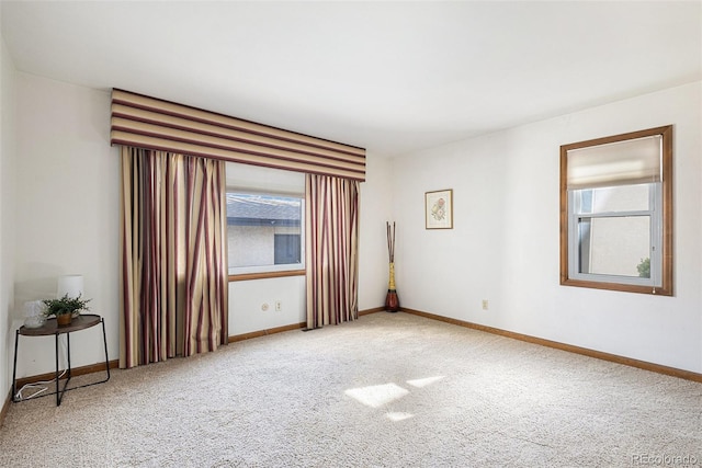 3103 Broadmoor Valley Rd Unit B, Colorado Springs, CO 80906 - empty room with carpet, baseboards, and a healthy amount of sunlight