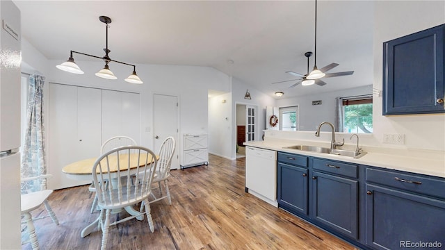 1750 Clark Dr, Erie, CO 80516 - kitchen featuring white appliances, blue cabinets, vaulted ceiling, ceiling fan, and light wood-style floors
