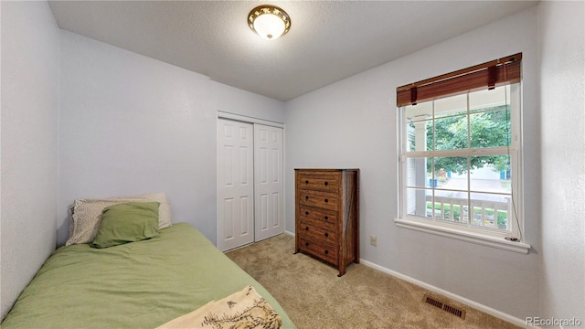 1750 Clark Dr, Erie, CO 80516 - bedroom with light carpet and a closet