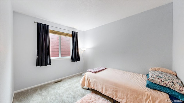 1750 Clark Dr, Erie, CO 80516 - carpeted bedroom with baseboards
