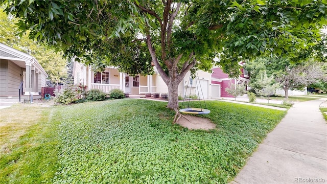 1750 Clark Dr, Erie, CO 80516 - view of front of home featuring covered porch and a front lawn