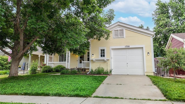 1750 Clark Dr, Erie, CO 80516 - view of front of home featuring covered porch, concrete driveway, a front lawn, and a garage