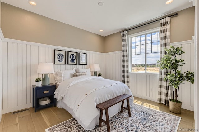 bedroom featuring light wood-type flooring