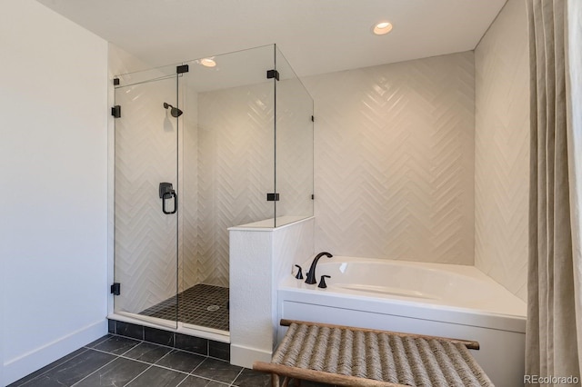 bathroom featuring plus walk in shower and tile patterned flooring