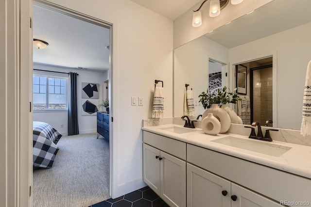 bathroom featuring tile patterned floors and vanity