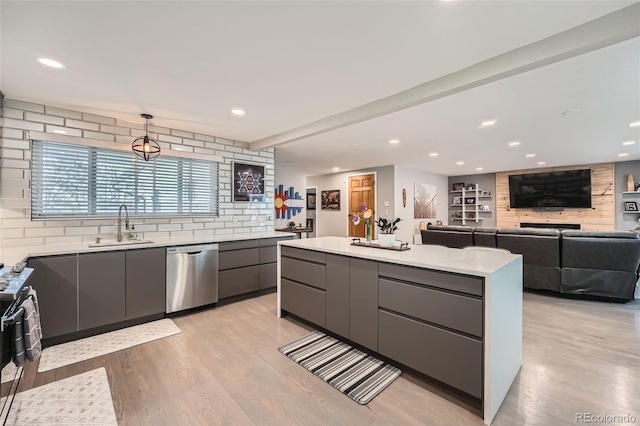 1025 Zang St, Golden, CO 80401 - kitchen with stainless steel dishwasher, a sink, gray cabinets, and modern cabinets