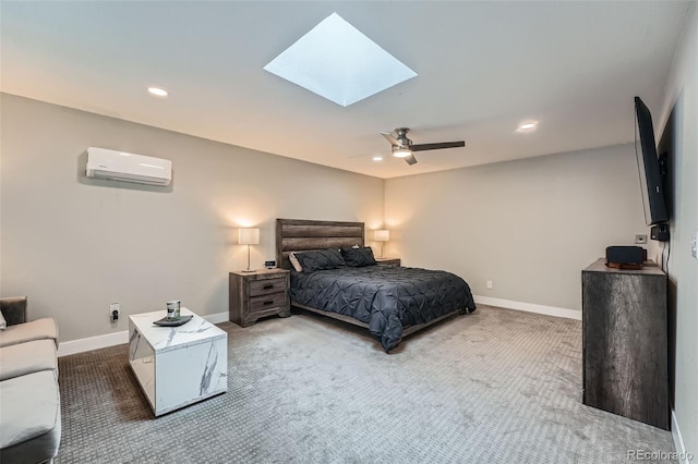 1025 Zang St, Golden, CO 80401 - bedroom with carpet floors, a wall mounted air conditioner, baseboards, and a skylight