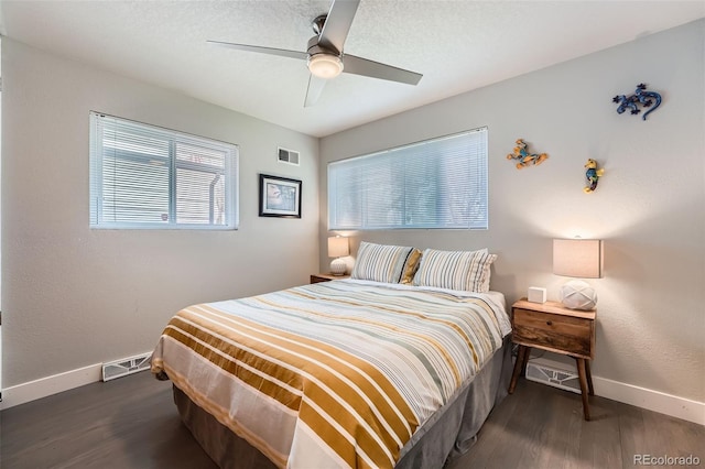 1025 Zang St, Golden, CO 80401 - bedroom with ceiling fan, baseboards, visible vents, and wood finished floors
