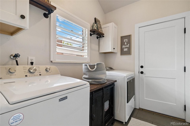 7440 Quail St, Arvada, CO 80005 - laundry area featuring cabinet space, separate washer and dryer, and tile patterned flooring