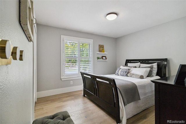 7440 Quail St, Arvada, CO 80005 - bedroom with light wood-style floors