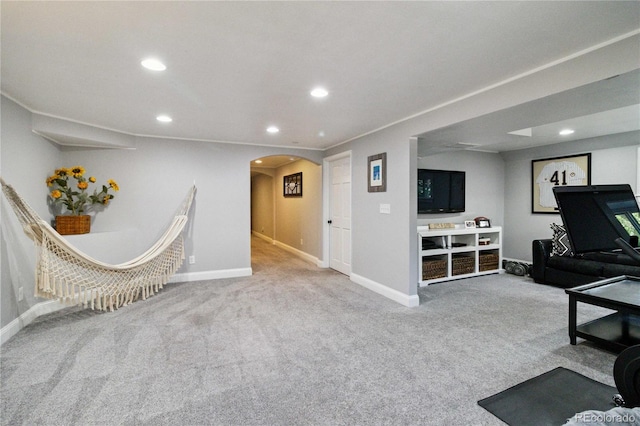 7440 Quail St, Arvada, CO 80005 - sitting room featuring recessed lighting, arched walkways, and carpet