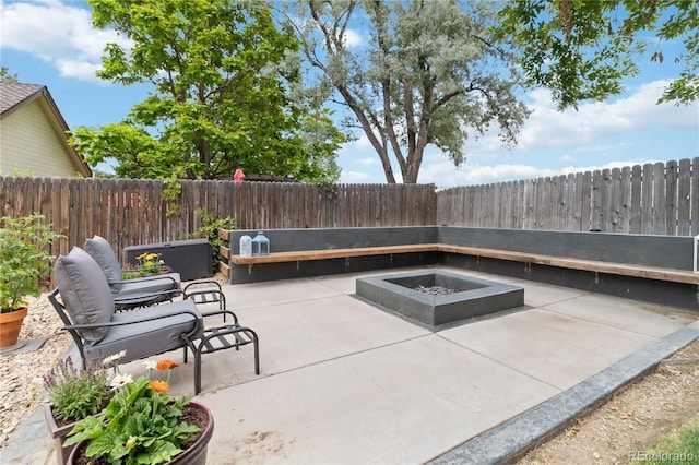 7440 Quail St, Arvada, CO 80005 - fenced backyard with a fire pit and a patio