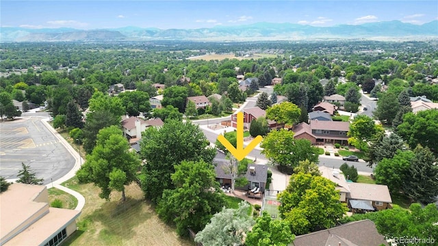 7440 Quail St, Arvada, CO 80005 - aerial view of residential area with a mountain backdrop