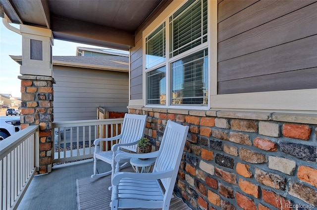 balcony featuring covered porch