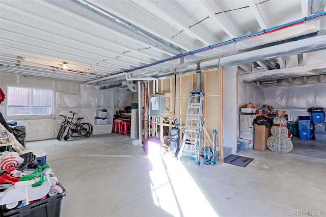 basement featuring water heater