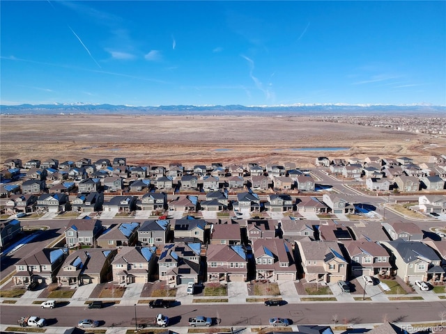 drone / aerial view featuring a mountain view