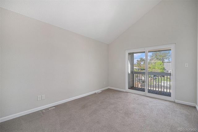 1403 Valentia St, Denver, CO 80220 - carpeted empty room with baseboards and high vaulted ceiling